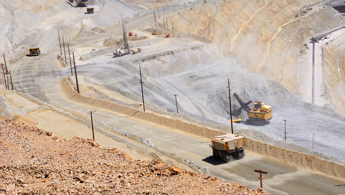 Dump trucks and excavator in a copper mine | Nickel, zinc, lead market outlook
