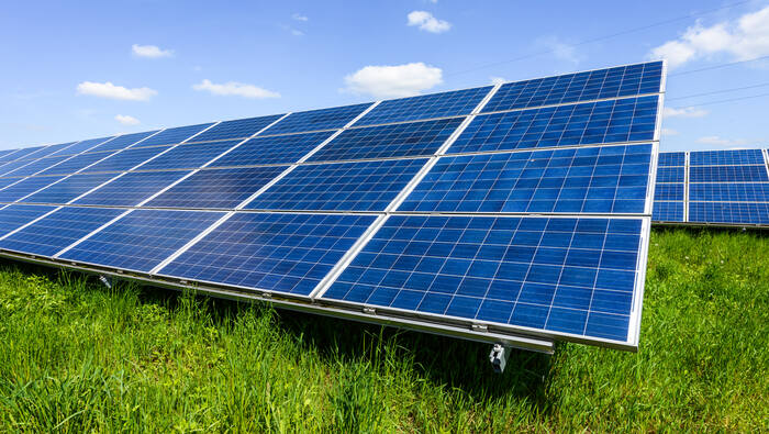 Solar panels and green grass